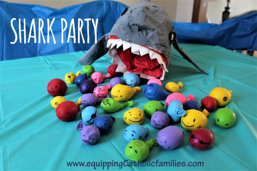 paper mache shark with rice-filled-balloon fishies