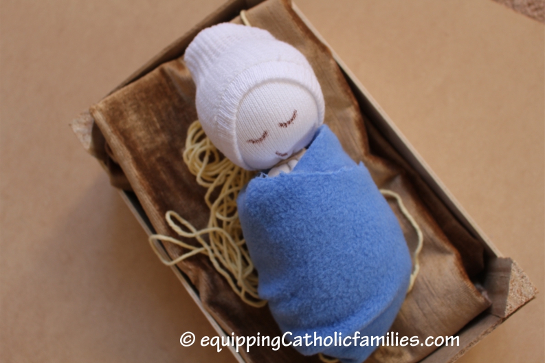 sock baby jesus in clementine crib 2